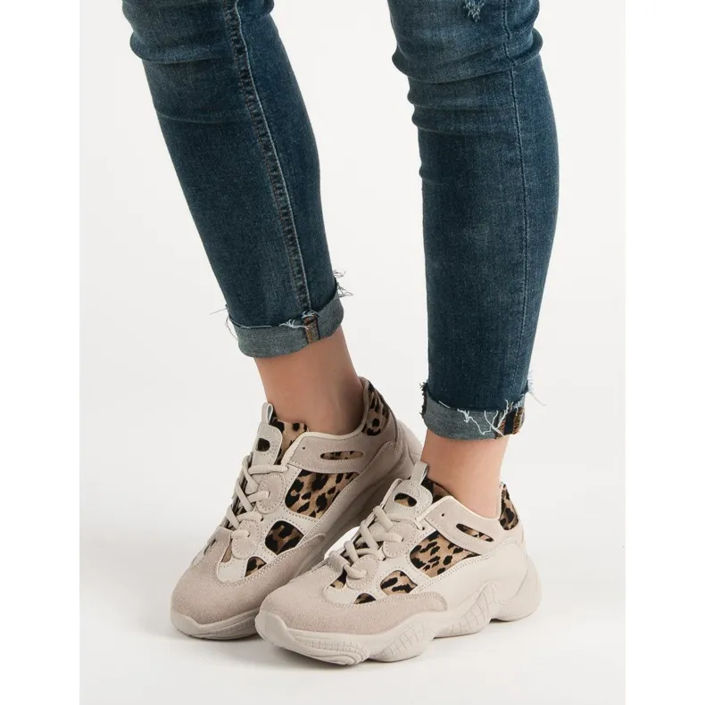 Beige sneakers met dierenprint