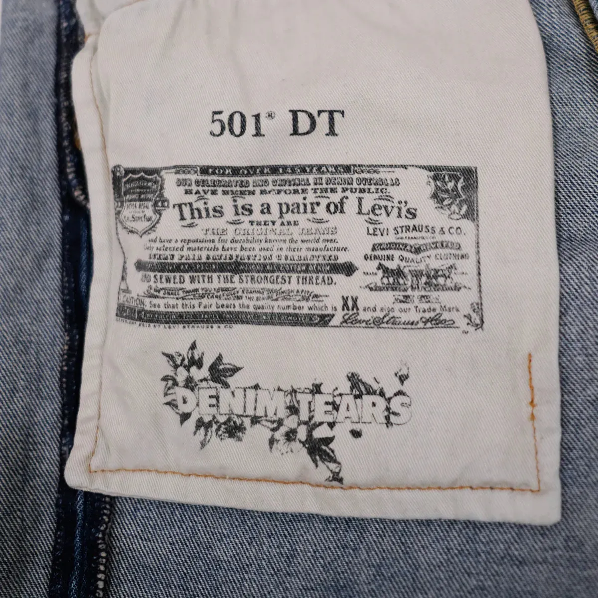 DENIM TEARS  THE COTTON WREATH JEAN LIGHT WASH