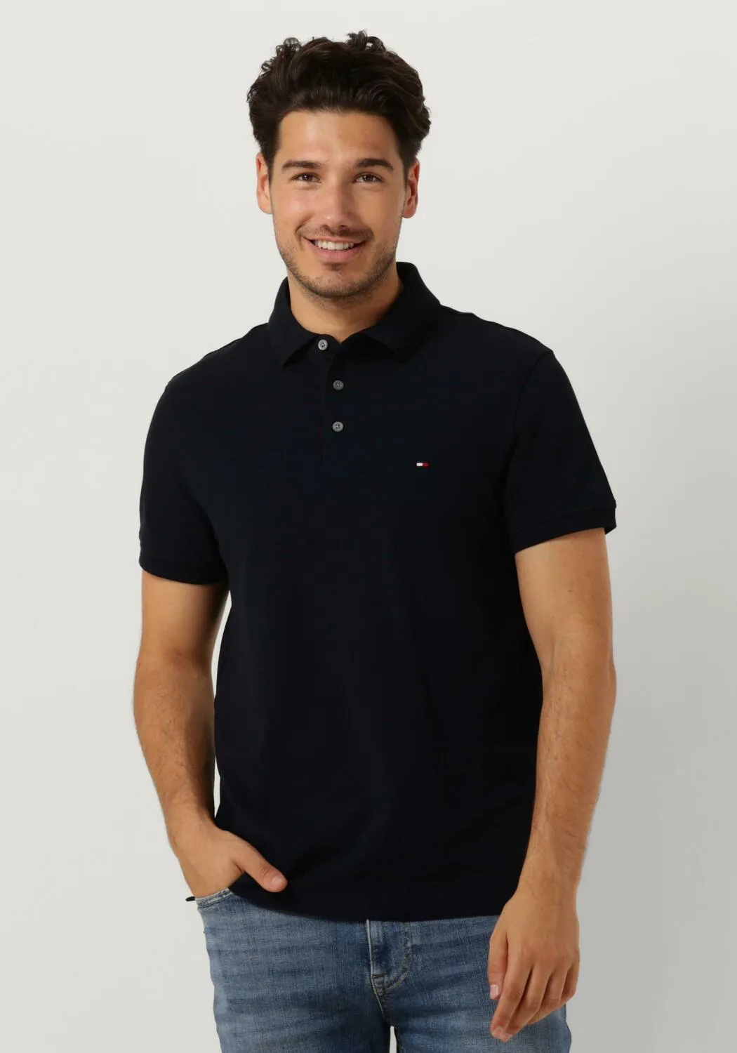 donkerblauwe tommy hilfiger polo core 1985 slim polo