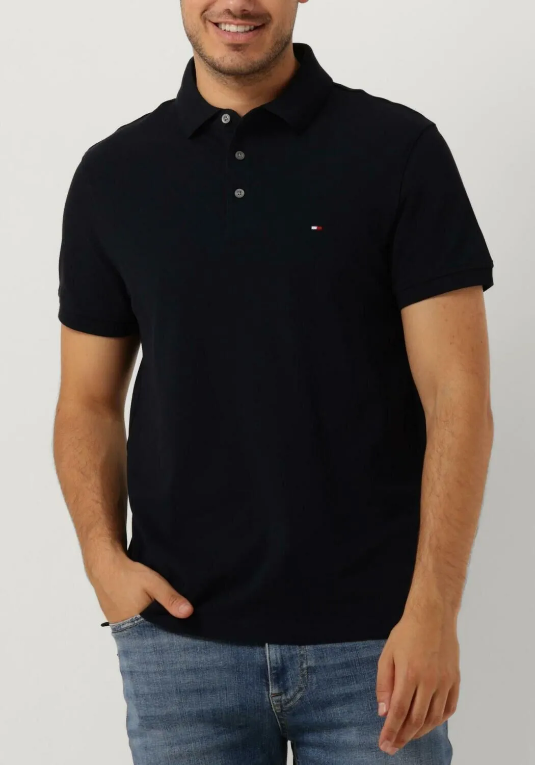 donkerblauwe tommy hilfiger polo core 1985 slim polo