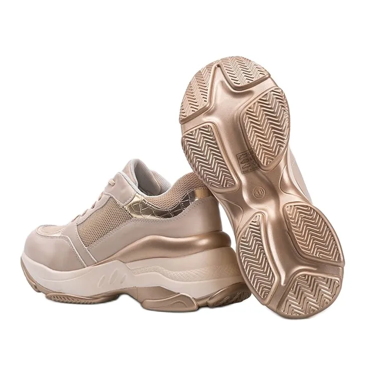 Gouden sneakers met dikke Lydia zool beige