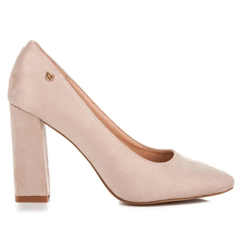 Vices Beige pumps op de pilaar