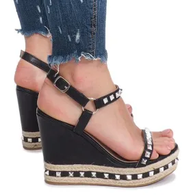 Zwarte sleehak sandalen met Cubano studs