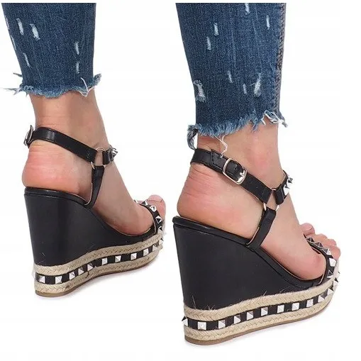 Zwarte sleehak sandalen met Cubano studs